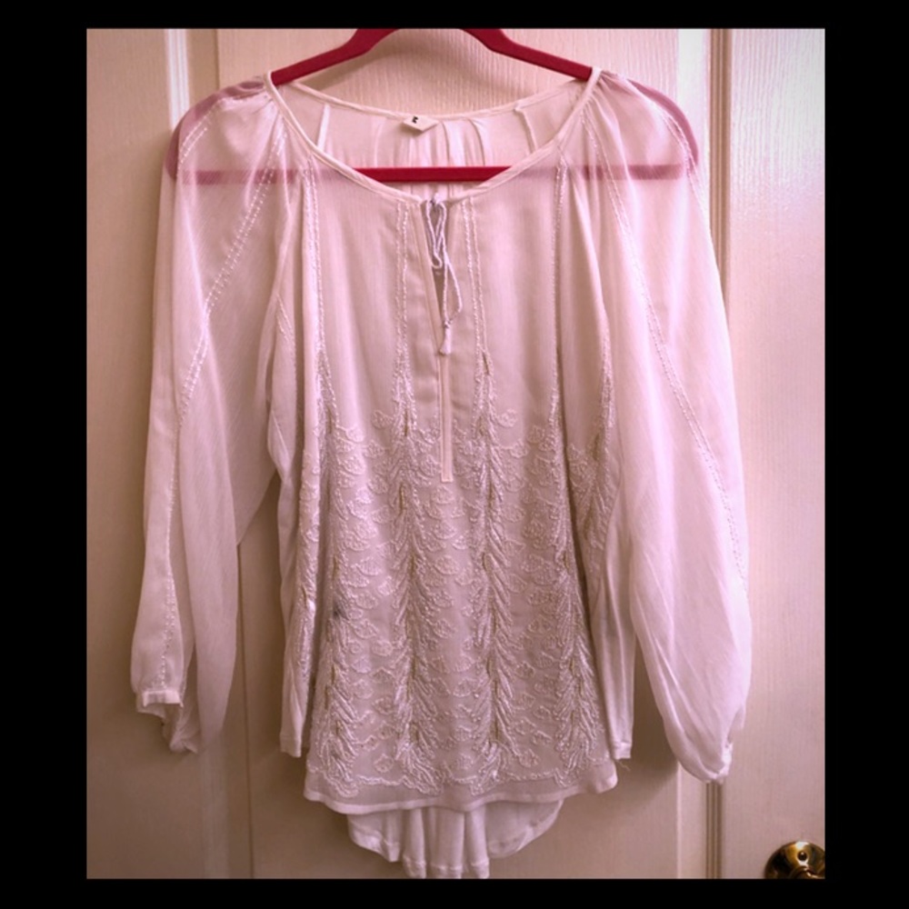 Long sleeve top with stitched design